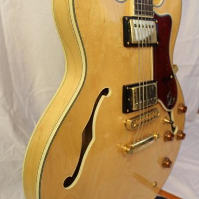 tem #12 Epiphone Sheraton Natural Electric Guitar

Price: $425.00

The Epiphone Sheraton is a thinline semi-acoustic, semi-hollow bodied...