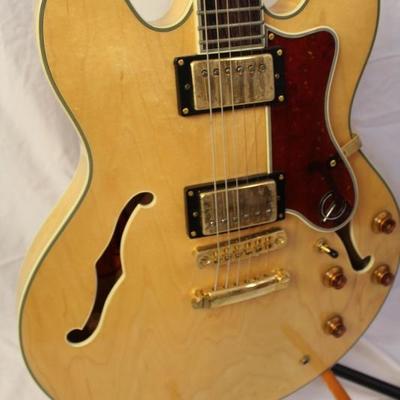 tem #12 Epiphone Sheraton Natural Electric Guitar

Price: $425.00

The Epiphone Sheraton is a thinline semi-acoustic, semi-hollow bodied...
