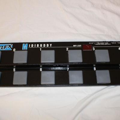 Item #34 Vintage RFX MP128 MIDI Buddy MIDI Controller

Price: $70.00
 
The MIDI Buddy sends standard MIDI program changes to select...