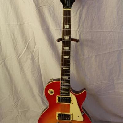 Item #4 Gibson Epiphone Les Paul 100, Serial # I98110592

Price: 425.00

Description:
The Les Paul 100 is a superb instrument for players...