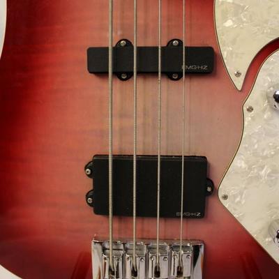 Item #7 Schecter Diamond Series Stargazer Bass Guitar

Price: $930.00

Description:
Dexterity:	Right-Handed	
Body Color:	Red
String...