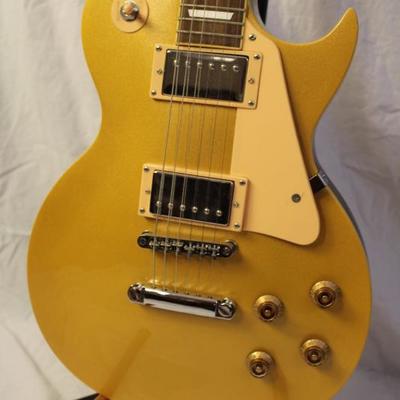 Item # 5 Indiana St. Paul Electric Guitar Les Paul Clone

Price: $450.00

Description:
The guitar plays nicely and it's a very solid Les...