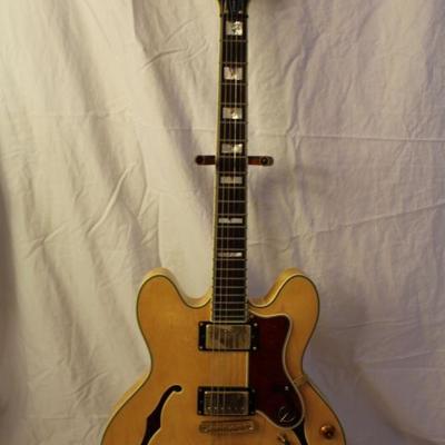 Item #12 Epiphone Sheraton Natural Electric Guitar

Price: $425.00

The Epiphone Sheraton is a thinline semi-acoustic, semi-hollow bodied...