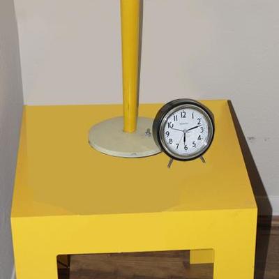 Retro yellow table and lamp, clock