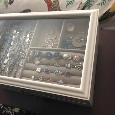 Assorted Jewelry featuring bracelets, rings, necklaces, and bangles