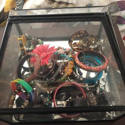 Assortment of costume jewelry ranging from bangles to bracelets