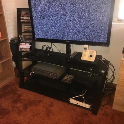 LARGE FLAT SCREEN TV WITH BOTTOM CABINET AND STAND