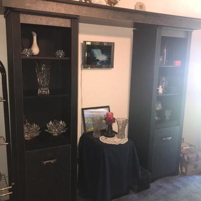 LARGE ENTERTAINMENT CENTER WITH LOTS OF SHELVES AND STORAGE
