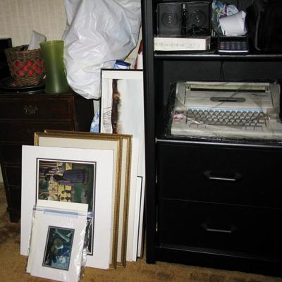 framed art and black finish bookcase
