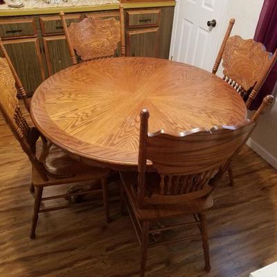 Claw foot table with 4 chairs
