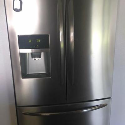 Stainless steel fridge like new less than 2 years old 