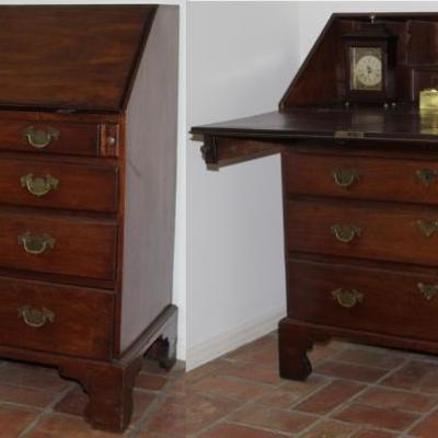 Antique Federal (Circa 1880's) Slant Top Drop Front Desk with pigeon hole storage  over a 4-Drawer Chest raised on Bracket Feet