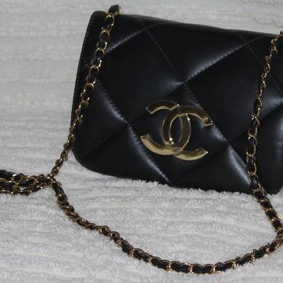 Vintage Genuine Chanel Handbag with Gold Tone Entwined C's on Front  Flap Closures and Stitched Entwined C's on Back with Gold Tone Chain...