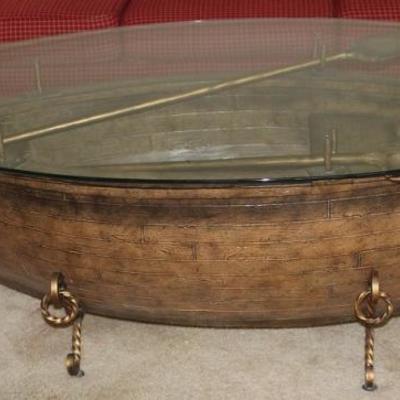 A very unique Glass Top Boat Coffee Table, complete with Paddles. Close up view.