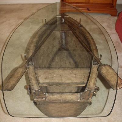 A very unique Glass Top Boat Coffee Table, complete with Paddles, inside view.