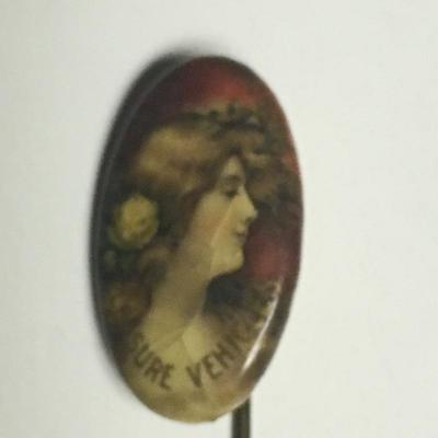 Celluloid stick pin advertising Ames Wagon Co