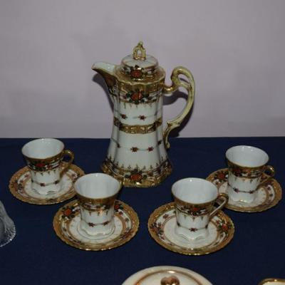 Teapot, cups and saucers