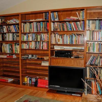 ONE OF SEVERAL BOOK CASES WITH BOOKS OF ALL DESCRIPTIONS 