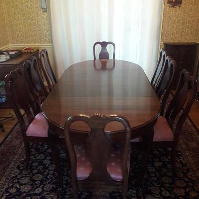 A welcoming dining set that could make any meal special. Protected tabletop in beautiful condition, along with everything else. Shown...