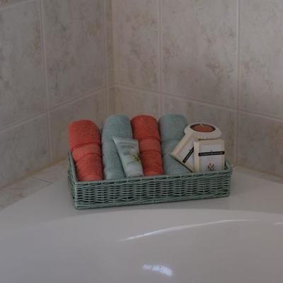Hand Towels. Soaps, Lotion in Basket