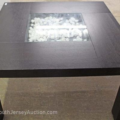 NICE 5 Piece Contemporary Table and 4 Chairs – Table has Inserted Decorative Rocks
Located Inside – Auction Estimate $200-$400
