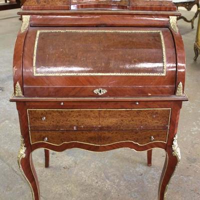 Burl Mahogany French Style Cylinder Roll Desk with Applied Bronze
Located Inside – Auction Estimate $100-$300
