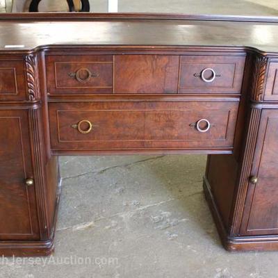 Burl Mahogany Knee Hole 4 Drawer 2 Door Sideboard by “Huntley Furniture”
Located Inside – Auction Estimate $200-$400
