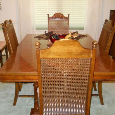 dining room table w/2 leaves & pads, 6 cane back chairs, Royal Ruby console bowl and underplate