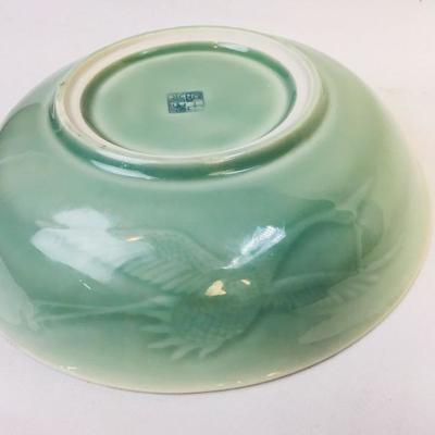 Chinese porcelain dish with celadon glaze
click the link to learn more and to bid...