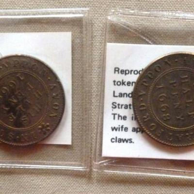 Two reproduction 1668 half pennies from England
