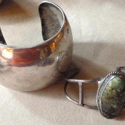 Two sterling silver cuff bracelets, one with stone

