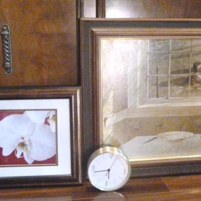 Two framed prints, 1 floral, 1 still life, and a  wall clock, Bigger frame is 23