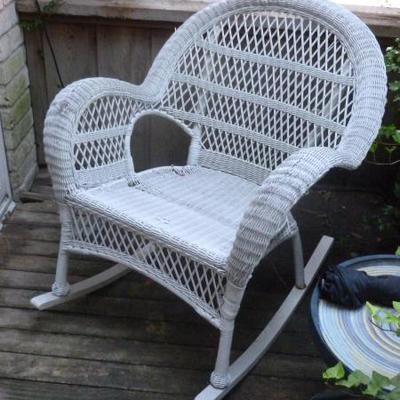 Set of two wicker chairs, one is rocker