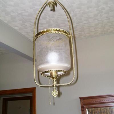 One of several antique light fixtures