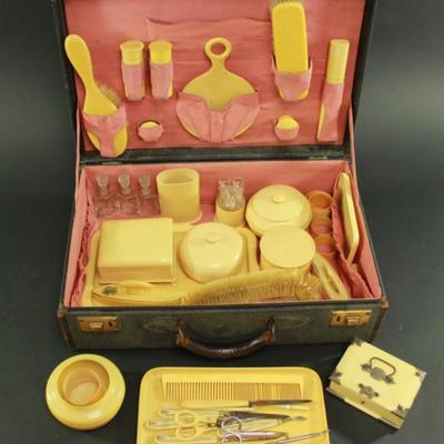Lot 89: 27-Piece Bakelite Grooming Kit 