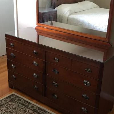 3 piece Mahogany Bedroom Suit by Mengel
Vintage circa 1940
6-drawer  Chest of drawers with custom glass-top
4-drawer Nightstand with...