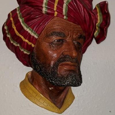 Abdhul

Produced 1961 to 1987. Sculpted by Fred Wright. Height 8 inches. Series A Composite.



Decorative collar and plain collar...