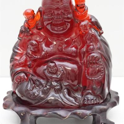 Vintage Large Amber Ruby Resin Laughing Buddha, With five children on custom wood stand. Measures 10