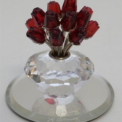 Swarovski Vase of Roses Celebrating the 15th Anniversary of the Swarovski Crystal Society. 15 exquisite ruby red roses on rhodium stems...