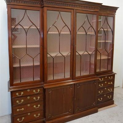 Large 20th c. Mahogany Breakfront. Featuring Gothic Cornice and Glass Moldings. Two Door and Eight Drawer Cabinet Base. Eight Shelves...