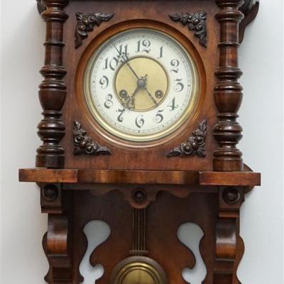 Antique German Regulator. Beautiful mahogany case, in excellent condition. Porcelain and brass face. Original pendulum, partial label on...