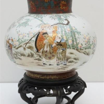 Exceptional Chinese Qing Polychrome Porcelain Vase. Artwork includes Shou with elongated earlobes carrying his staff and gourd, along...
