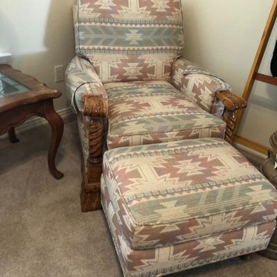 Beautiful western oversized chair with detail carvings on side along with nice ottoman