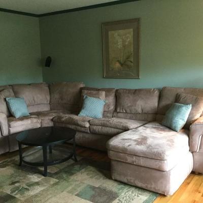 Sectional in like new condition with 2 end table, coffee table, lamps