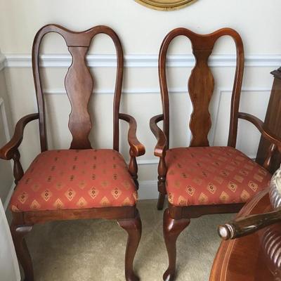 Cherry wood captain chairs. Asking $50 each.  Also have matching cherry wood dining chairs without sidearms. Asking $40 each.