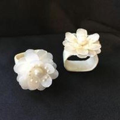 Mother of pearl napkin rings. Around 15 available. Asking: $5 each.