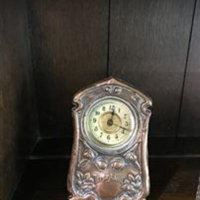 Copper Art Nouveau clock. Fully functioning. Asking: $40.