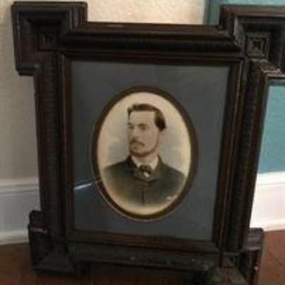 Antique photograph. Hand painted in color. Framed. Asking: $36.