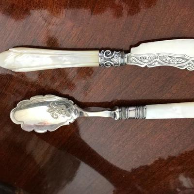 Antique Birmingham sterling silver butter knife with mother of pearl handle (asking: 75).  Spoon is plated silver with mother of pearl...