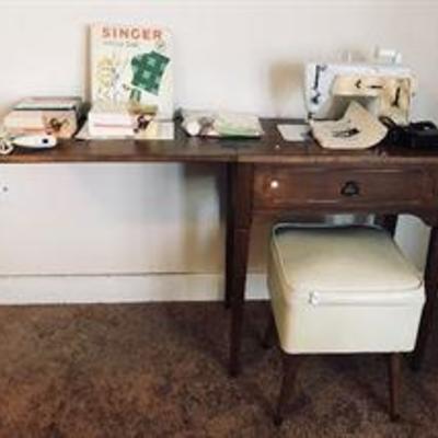 SINGER machine Model 603, table, storage stool and extras. Excellent condition. Singer sewing machine with table (asking: $170). Vintage...